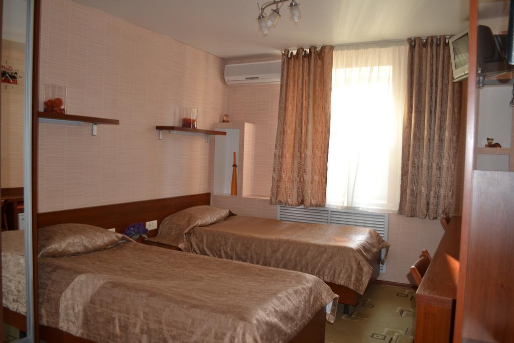City Hotel Gomel Room photo