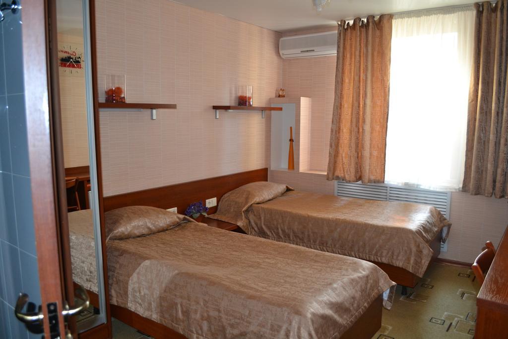 City Hotel Gomel Room photo
