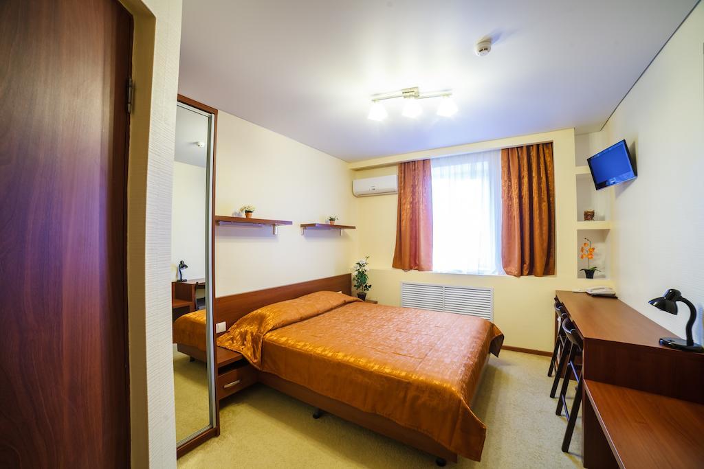 City Hotel Gomel Room photo