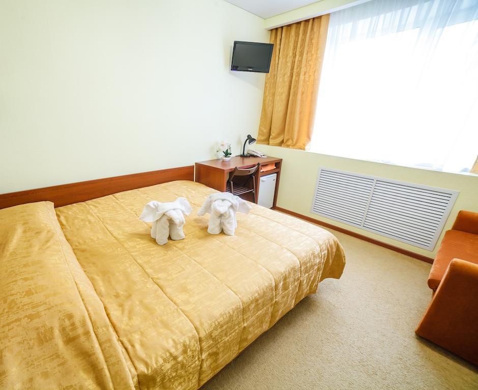City Hotel Gomel Room photo